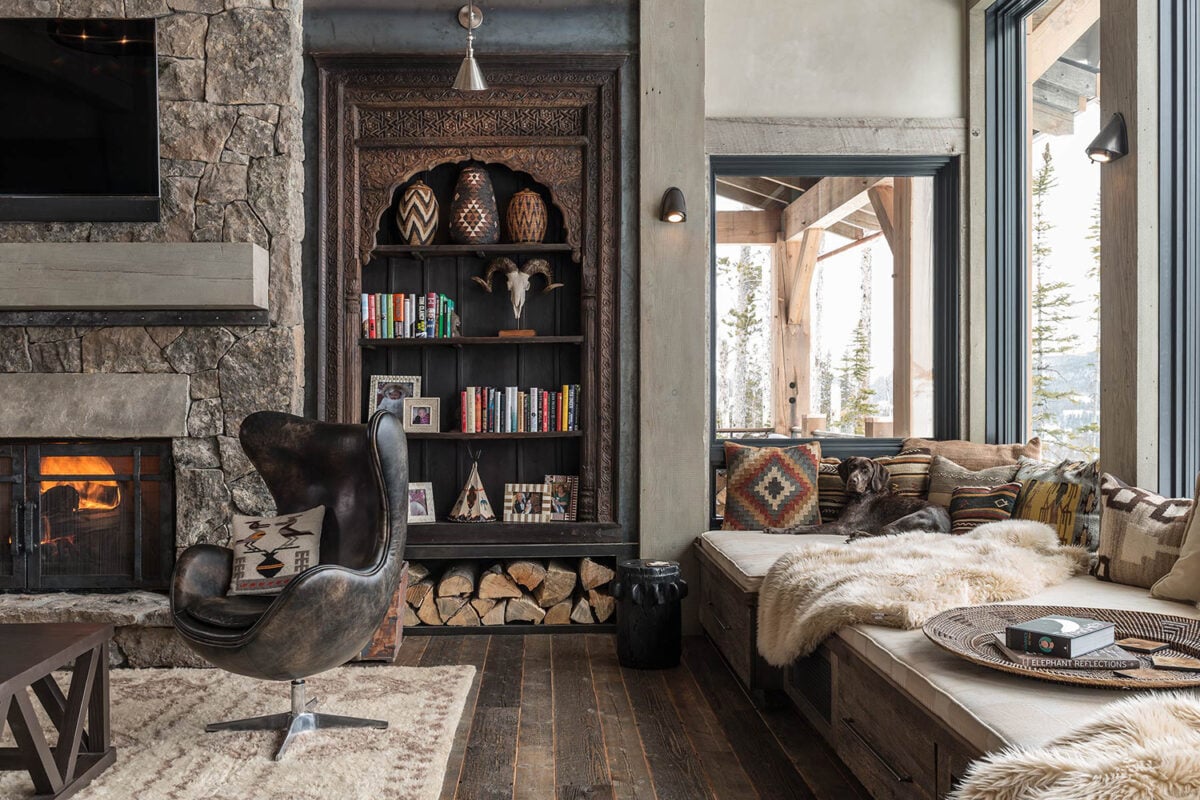 Rustic Southwester living room with dark wood flooring, vintage accents and leather furniture