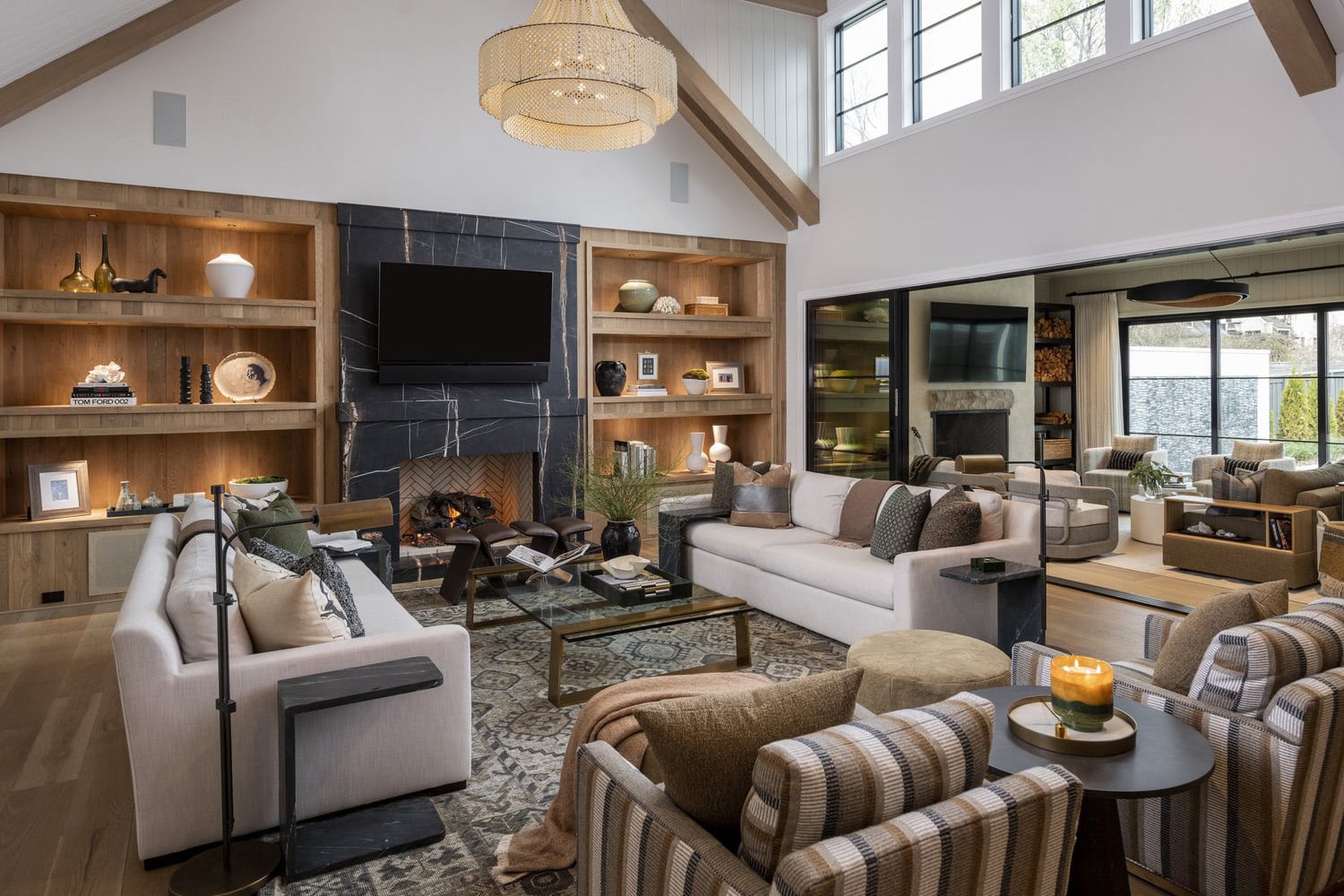 A modern rustic living room with open wood shelving with LED lighting