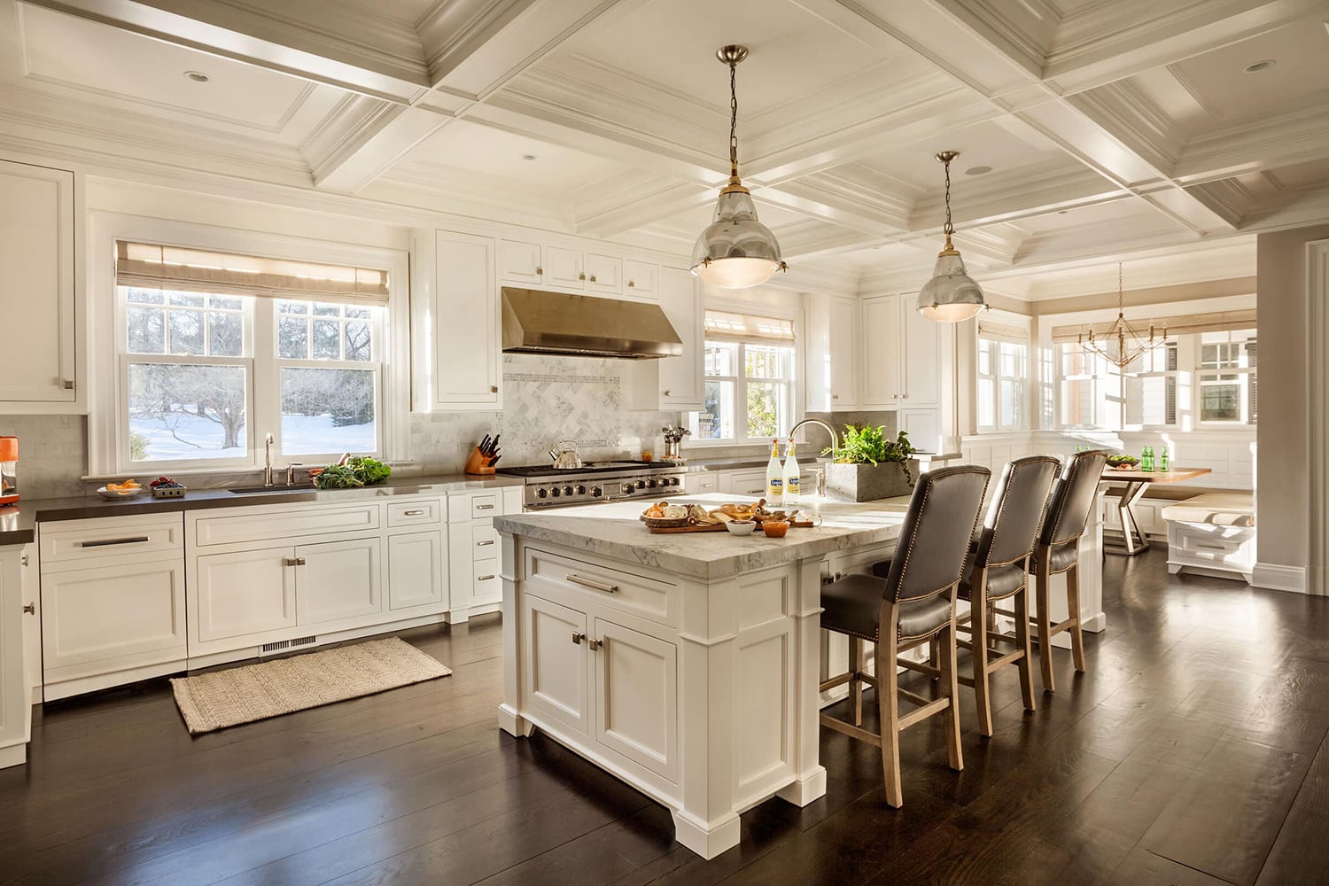 Country kitchen with dark wood flooring and white cabinets, Benjamin Moore White Dove.