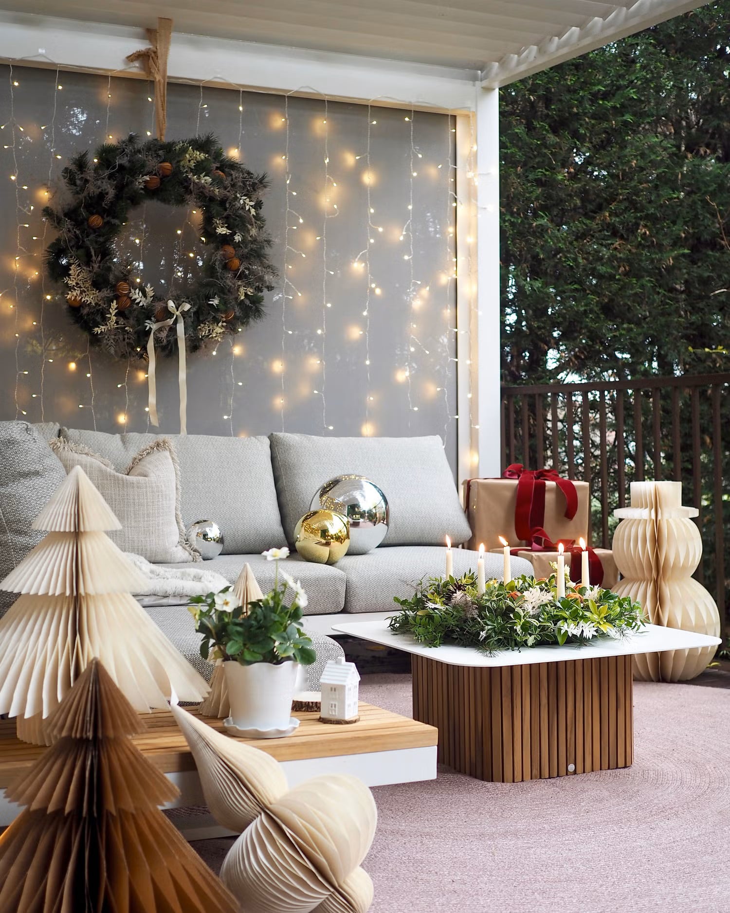 Outdoor Christmas living room with a wreath and ornaments