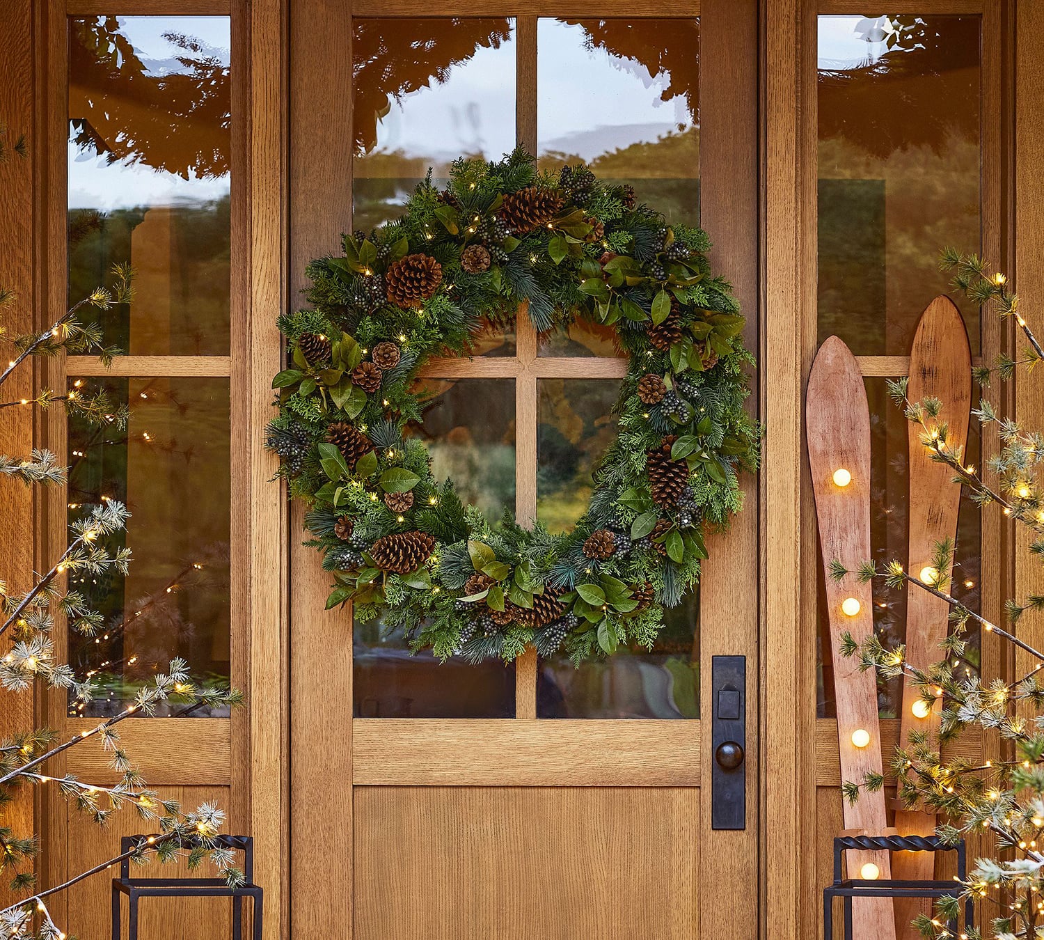Wood home with a natural green wreath