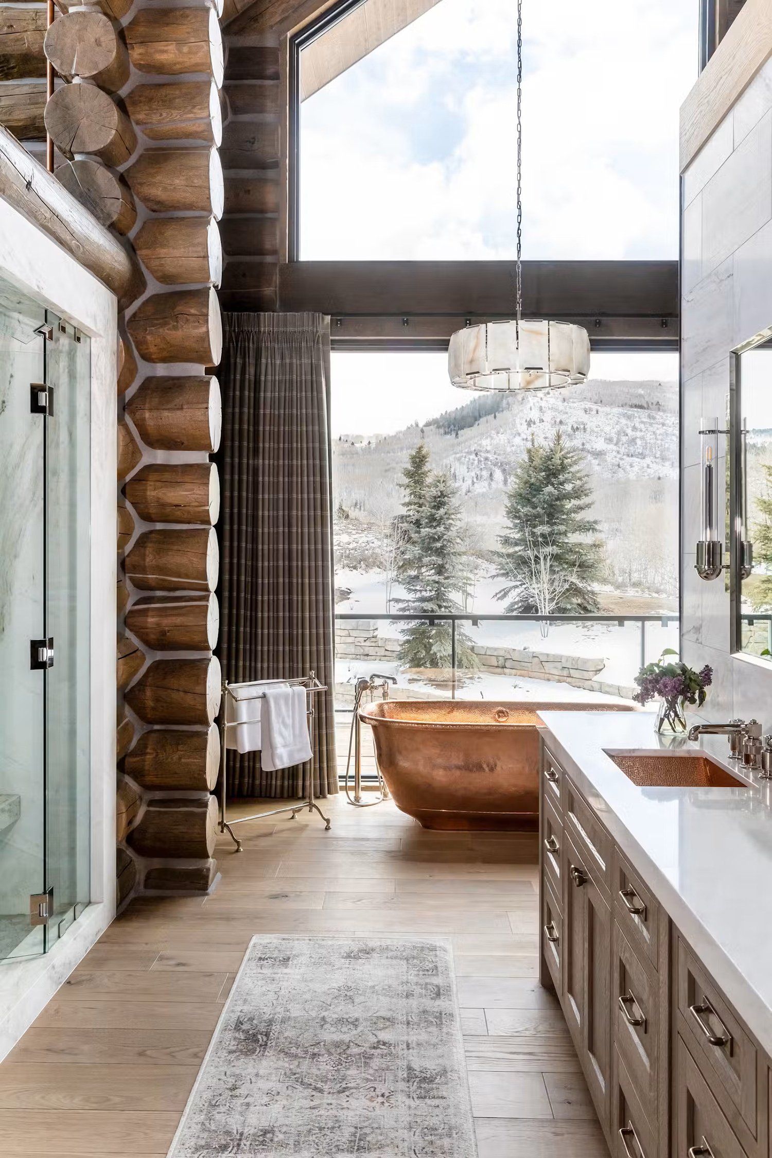 bathroom-in-a-handcrafted-log-cabin Bathroom in a Handcrafted Log Cabin with a Copper Bathtub.