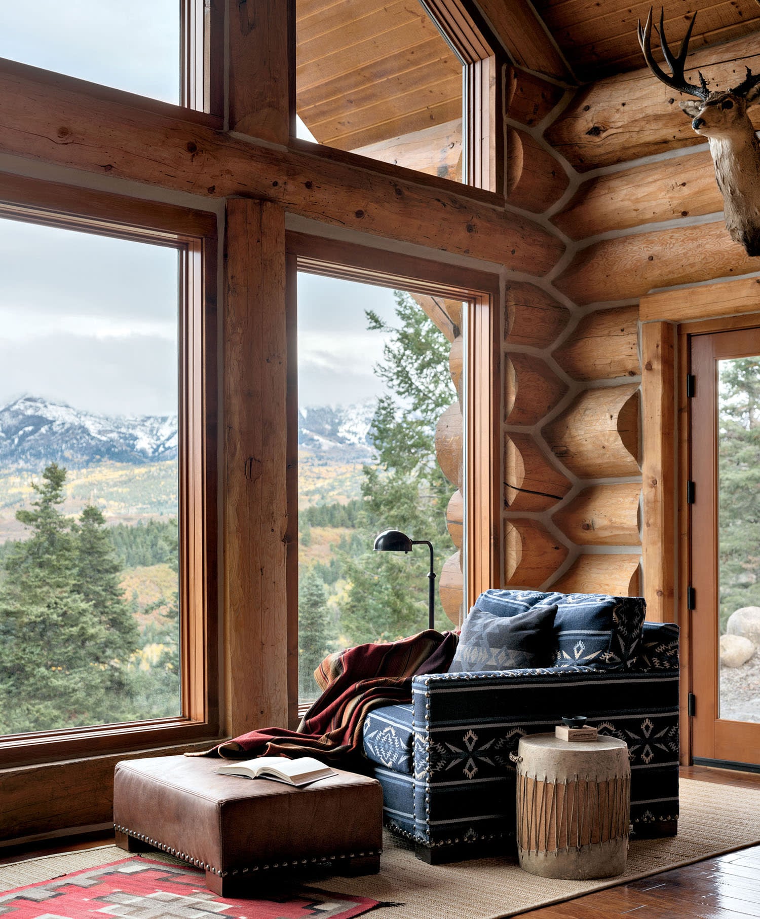 Handcrafted log home with Southwestern textiles.