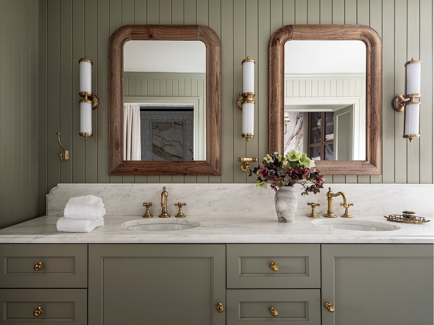 green-bathroom-with-wood-framed-mirrors Green Bathroom With Wood Framed Mirrors