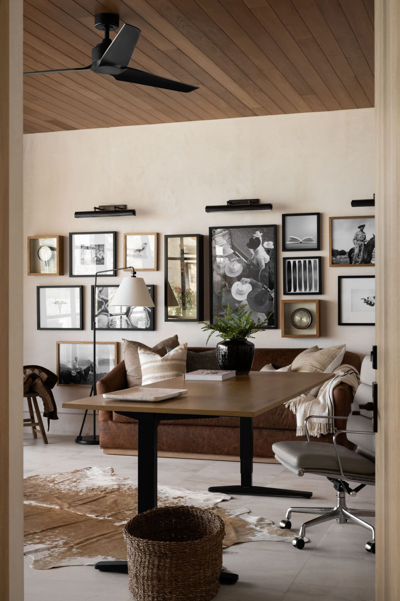 Cowboy Western Home Office with Cowhide Rug & Western Art