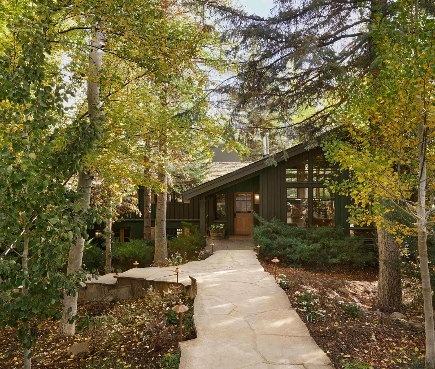 Exterior view of the Gaines Colorado home painted in Trailhead from Magnolia Home.